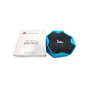 Parche convencional Rema Tip Top PN 07 apilado junto a su caja blanca con logo y texto en rojo
