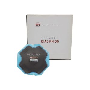 Parche convencional Rema Tip Top PN 06 apilado junto a su caja blanca con logo y texto en rojo